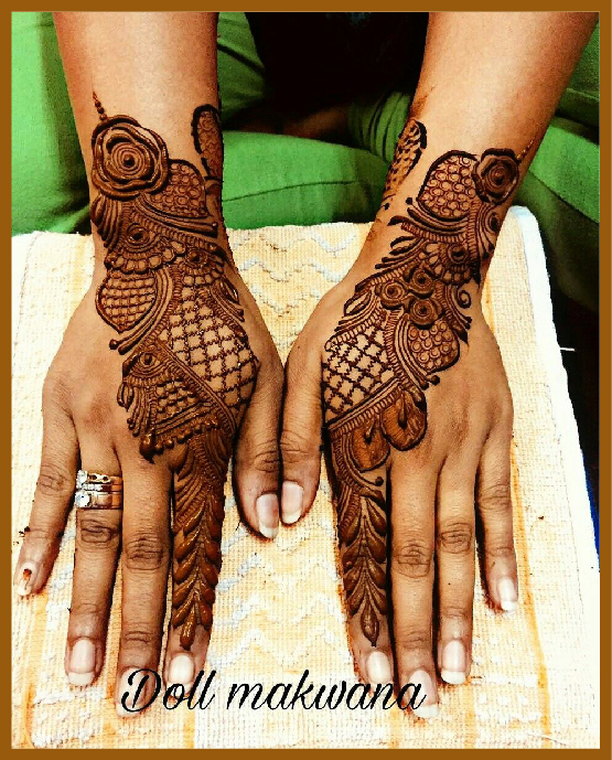 Stylish Back Hand Mehndi Art With Netted Pattern From One Finger